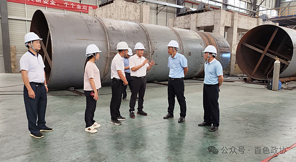 调研组在西林县金山工业园区正丰环保科技有限公司调研.jpg